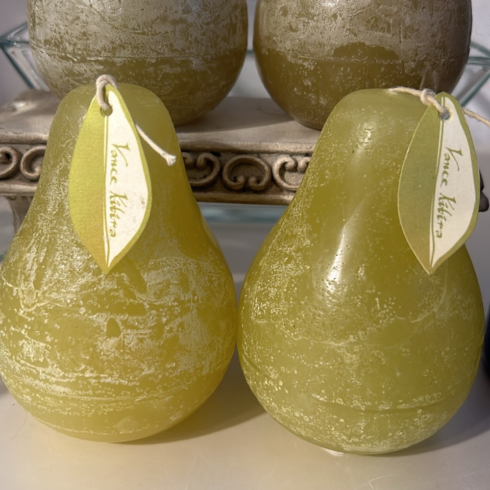 2 Vance Kitira, unscented pear shaped candles.